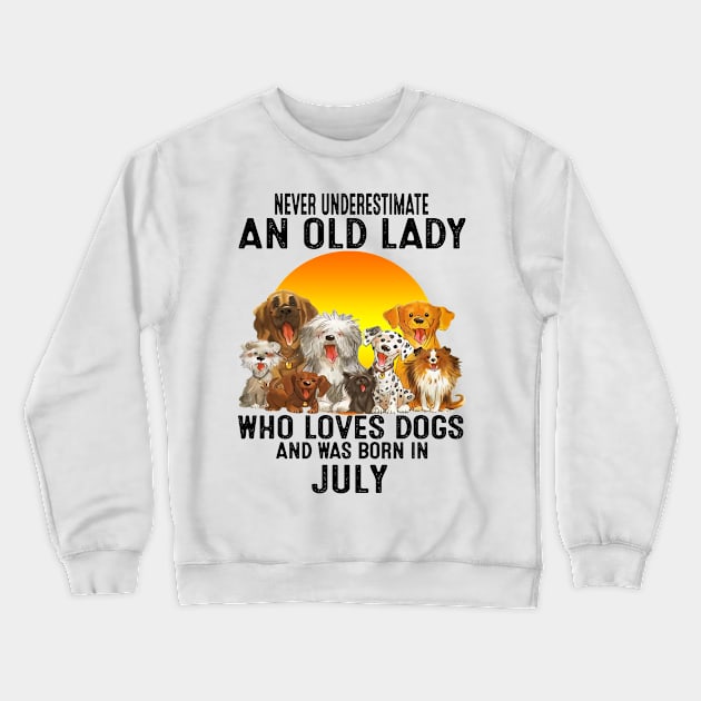 Never Underestimate An Old July Lady Who Loves Dogs Crewneck Sweatshirt by trainerunderline